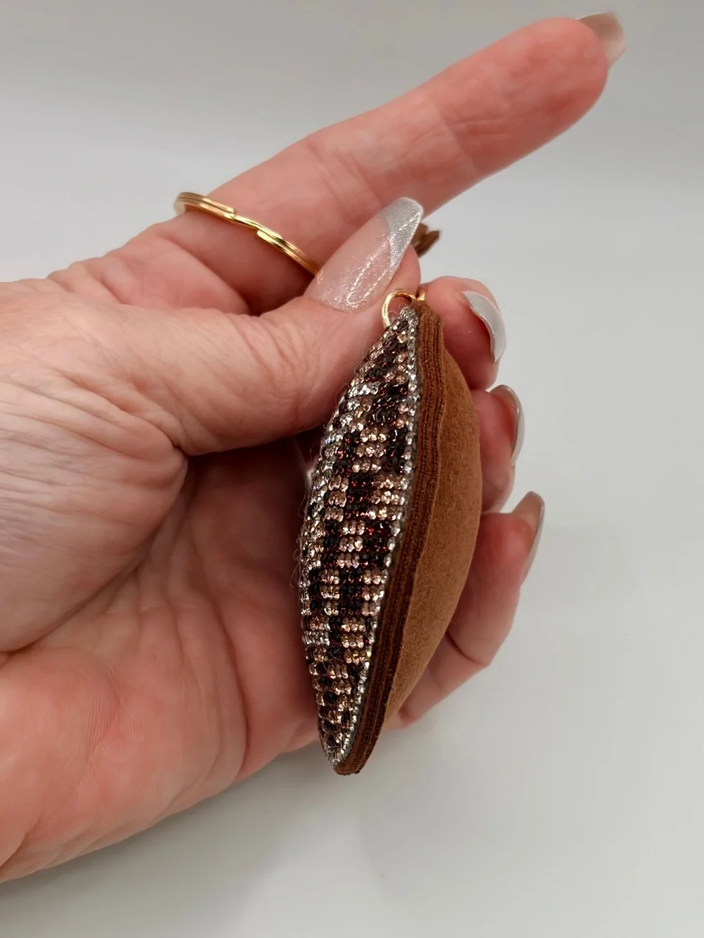 Crystal-Embellished Round Keychain Charm in Brown and Gold